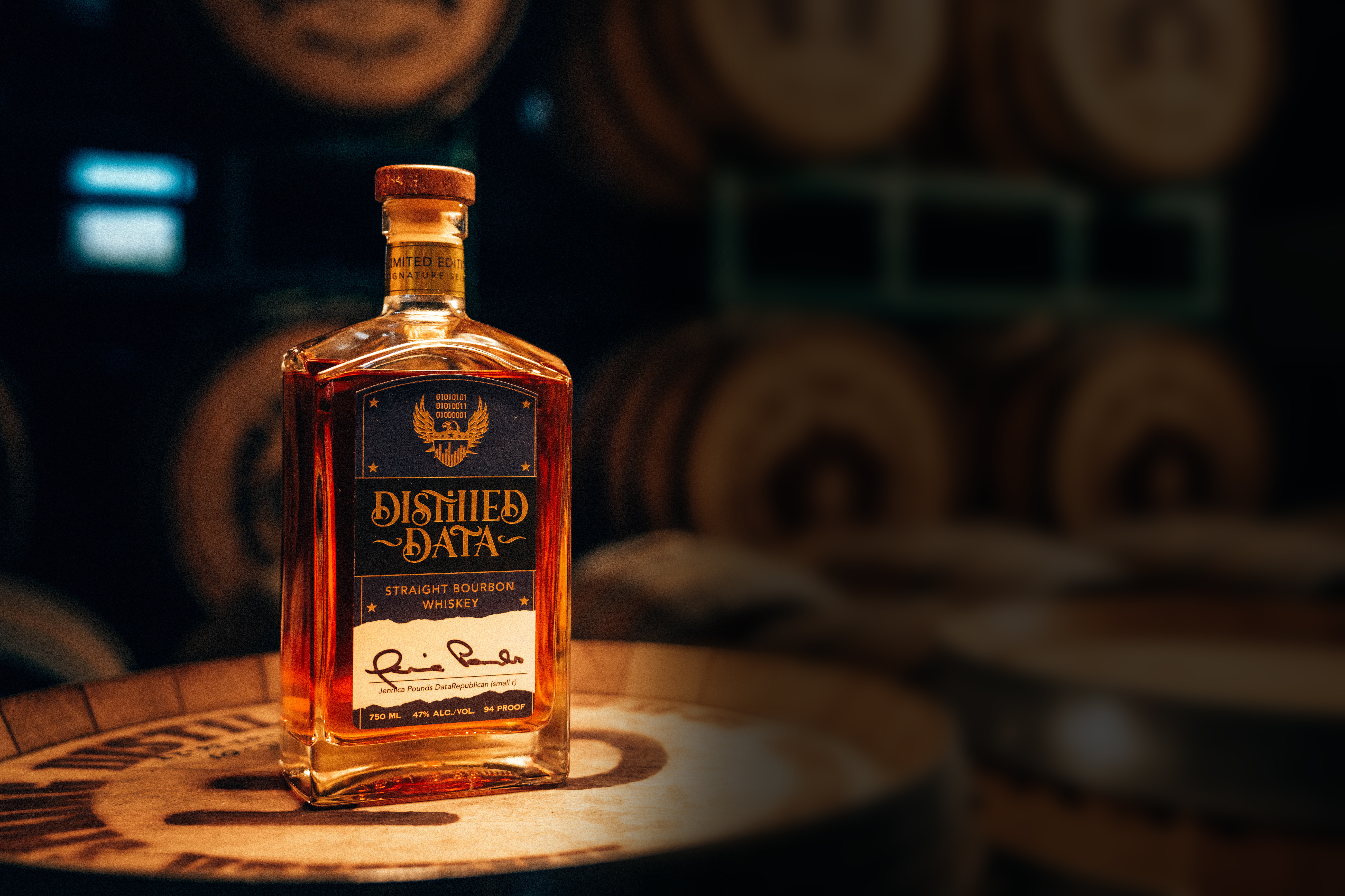 Distilled Data Bourbon Whiskey Bottle - Professionally photographed. Sitting atop an aging barrel.